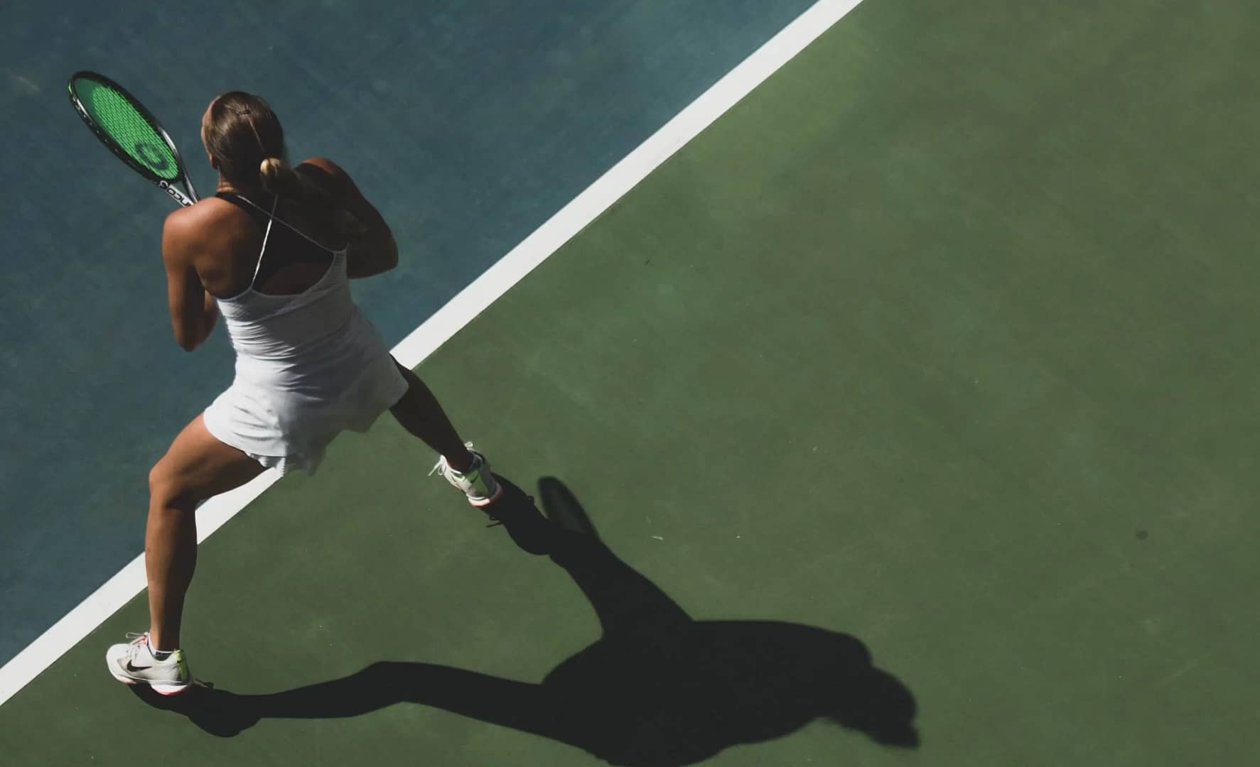 Female athlete playing tennis